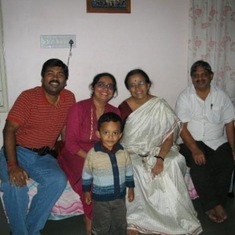With Lakshmi's son in Lakshmi's home