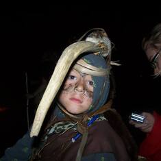 Still wearing the head dress at Cave Man night...it hurt him to wear, but he wouldn't take it off!