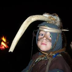 So serious about his head dress on Cave Man night!!
