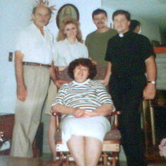 US WITH FR.DON KLOSTERMAN IN THE LIVING ROOM 1989
