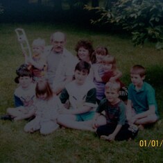 Grama and Pappy surrounded by all their grandchildren- at the time