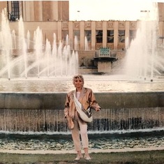 My Dearest Mama if front of the fountains of Trocadéro in Paris, France.