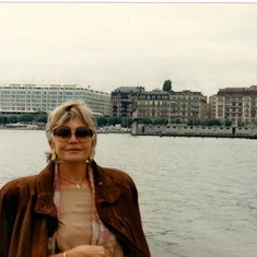 Mama in front of the Seine River in Paris.