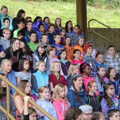 Camp Seymour 2015: Sam in red hat with 5th graders