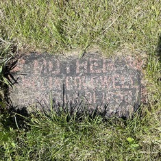 Small stone for Amelia (Olmer) Coldwell - NW corner of St. Francis cemetery.  4 rows in.