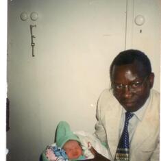 With his newly born granddaughter, Sibongile Soko