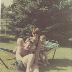 On the hammock in Minnesota, 1968.  My father set the timer then rushed to pose for the picture.