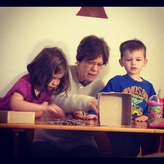 Sandee loves to do puzzles with her grandchildren. 