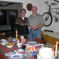 Sand and Ron at their Pittsburg home, with their bike that has traveled around the world