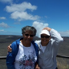 Aunt Edy and Evelyn standing by a volcano!