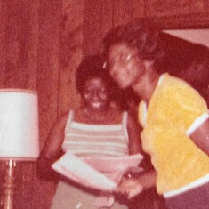 Evelyn with big sister Ann, 1981