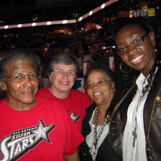 WNBA player Sophia Young with Evelyn, Sheila and Karen.