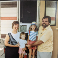 Sarah & Ted with camper and Biz & Becky during visit to Downers Grove in 1984.