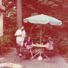On the little patio of a mansion on Embassy row in DC that we lived in rent free. See story.