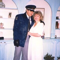 Sally poses proudly beside her son Michael. This photo was taken around 1985 when Michael was working in security to pay for part of his undergraduate education.