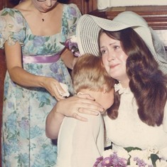 Sarah was Auntie M's flower girl, crying because she thought I was dying. Ginny is the bridesmaid.