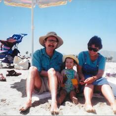 Uncle Mike & Aunt Judy at the beach in California with Sarita