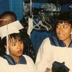 Sandy and Gina at their Northwestern High School graduation ceremony.  Sandy looks puzzled....