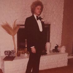 Perms for the guys were the style in '78-'79. I gave him the perm! Prom perm!