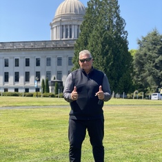 On his retirement day with the State of Washington Capitol in Olympia 