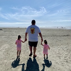 Opa with granddaughters Layla Zey and Scarlett Scott at the beach 