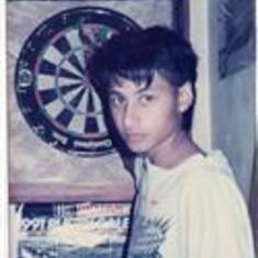 Selwyn 1991 taken just before his 17th birthday playing darts at home.