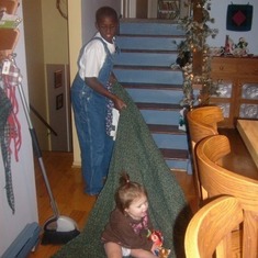 Seth playing with Ella blanket rides! He was 11