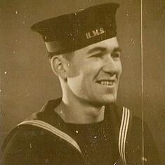 Charles in the Royal Fleet Auxillary uniform. This was the period when he was involved in a wartime project called PLUTO; Pipe Laying Under The Ocean.