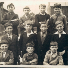 Charles, centre left, having a class photo taken in Coedpenmaen Primary School, Pontypridd. circa 1930