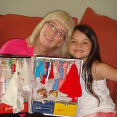 Sharon giving Regan her 1959 Barbie collection