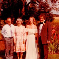 the wedding couple with the hosts, Uncle Fred and Aunt Margie