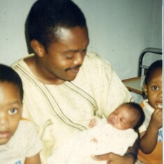 Shawcross Moore with Chimaobi Shawcross Godwin Jr. (Son), Alexander Shawcross-Obioha (Son) and baby Christine