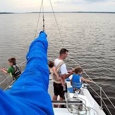 Super dad on the sailboat.