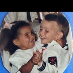 His first girlfriend Brianna we lived in Guam as we were a military family and he was the ring barer for Brianna's moms wedding. He was so cute in his Navy whites