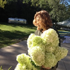 Sheryl transporting lots of flowers!