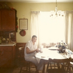 This was after mom came home from Johns Hopkins Hospital after being there for 6 months. Her hair was starting to grow back. Caught eating :)  She had to learn how to pretty much everything all over again..walk, write, draw, etc. This was when she was doi
