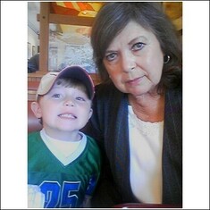 mom and rylan at Roy Rogers Restaurant