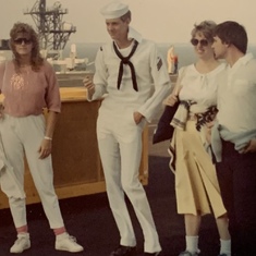 Louanne, John, Suzanne and Butch on the deck of the NIMITZ