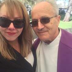Charlena and the priest from Croatia who officiated at Sime's furneral service.