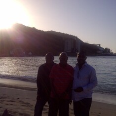 Papa with Okey and Chijioke by a beach in Ocho Rios, Jamaica