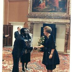 Sir Wilmot shaking hands with the Queen of The Netherlands.