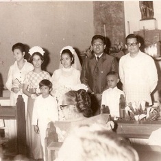 A year before he would be detained for seven years under martial law, Senator Benigno "Ninoy" Aquino served as wedding sponsor.  

Seven-year old Giovanni Alviar was the ring bearer.