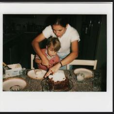 Sonia helps Alan cut the cake, 1981.