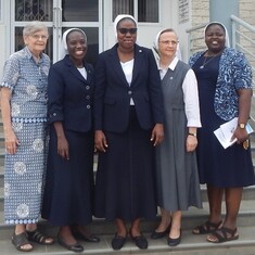 Sister Gloria and her community members