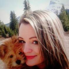 Lovey Stace with Penny on a hike trip to the Rocky mountains.