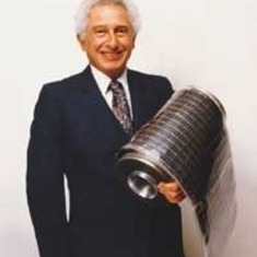 Stan with a roll of thin film photovoltaic cells.