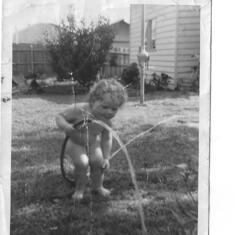 Margaret (Baby) at home with hose on a hot day.0002