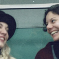 Stef and Jen, one of my favorite pics of us even though it's blurry because the train is moving, subway, Japan, 1997.