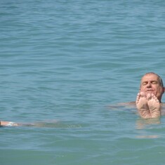 Papa and Angelica swimming in the ocean in Florida