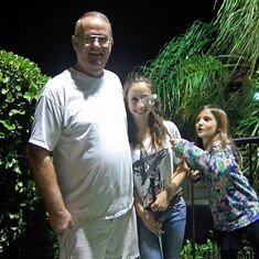 Papa Playing Mini Golf with the Girls in Florida -February 2012.  Dad was having difficulty swallowing and his speech was just starting to slur when we visited.  That didn't stop him from Beach trips, taking his grand daughters to the Aquarium, or playing